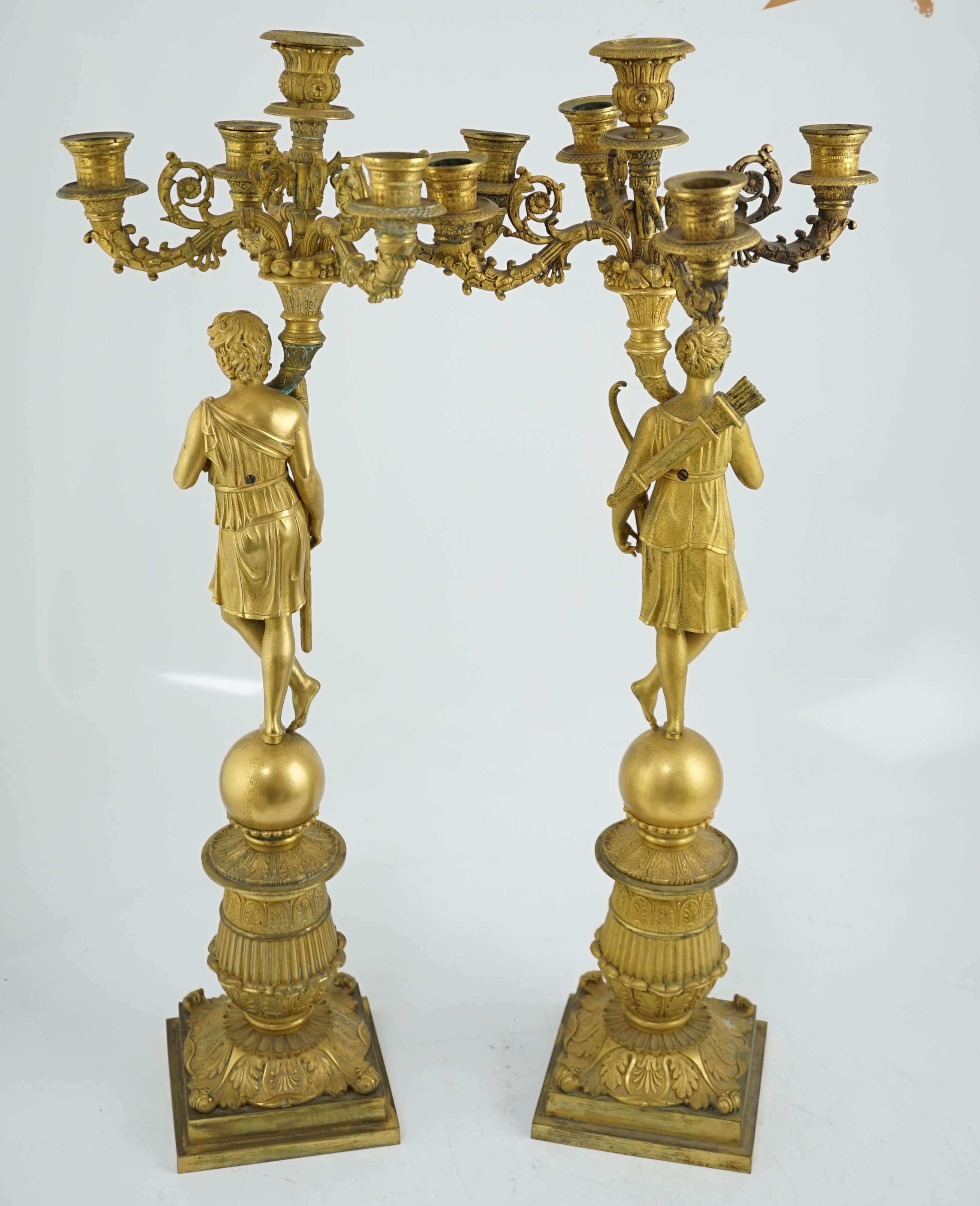 After Pierre-Philippe Thomire (1751-1843), a pair of Regency French Empire five light candelabra 25cm wide, 64cm high